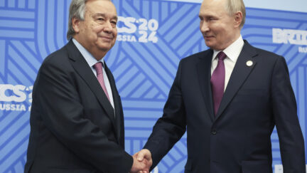 United Nations Secretary-General Antonio Guterres and Russian President Vladimir Putin shake hands during a meeting on the sidelines of the BRICS Summit in Kazan, Russia, Thursday, Oct. 24, 2024.